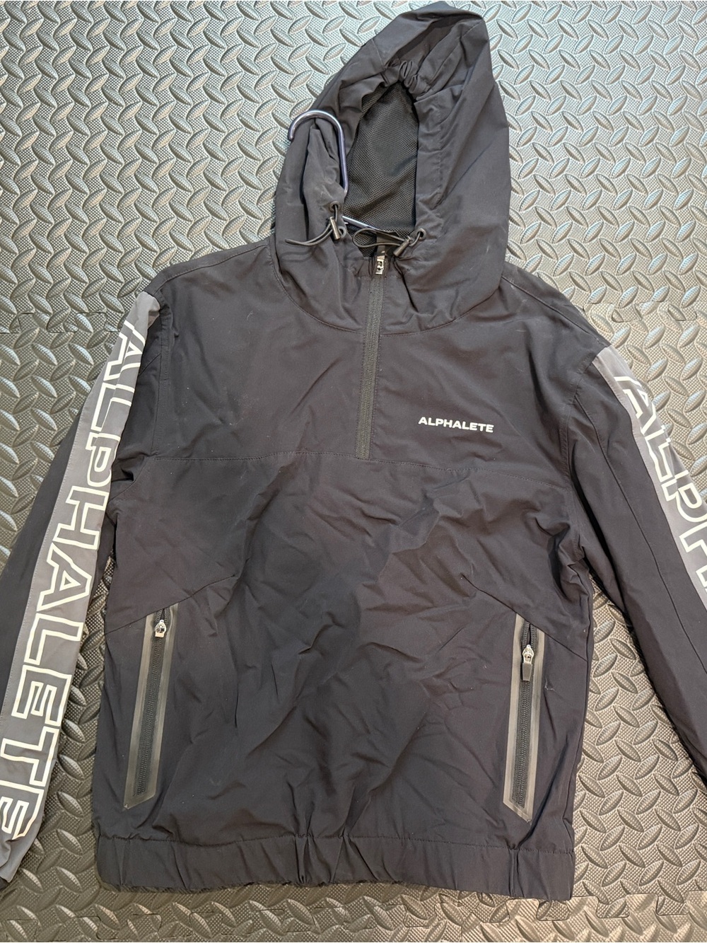 Alphalete Black Hooded Windbreaker with White Sleeve Logo